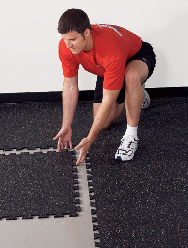 Interlocking rubber tiles are easy to apply and protect your gym floor from many harms